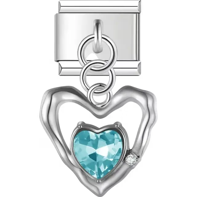 Open heart frame with blue faceted crystal centerpiece and small clear stone accent Italian charm bracelet link