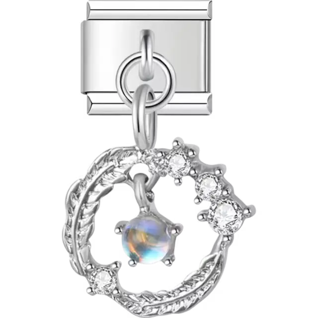 Circular wreath with braided design clear gemstones and central iridescent gem Italian charm bracelet link