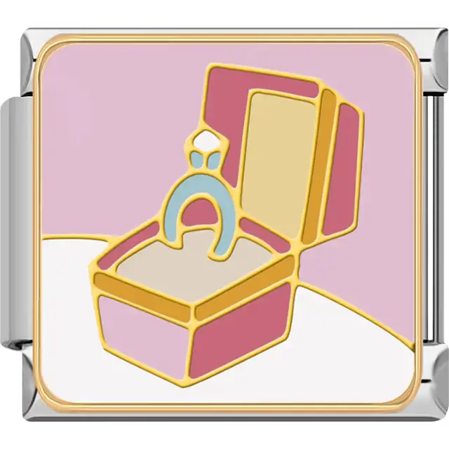 Blue engagement ring in pink jewelry box on light pink background Italian charm bracelet link