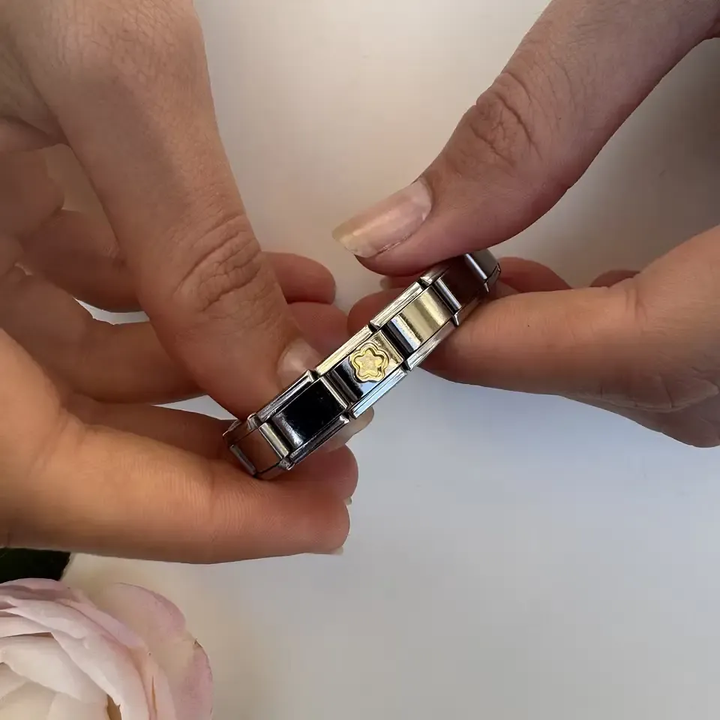 Shiny gold flower blossom with a smooth raised design on a silver background Italian charm bracelet link