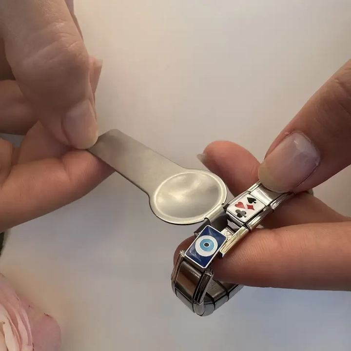 Tool for attaching and removing links from Italian charm bracelets