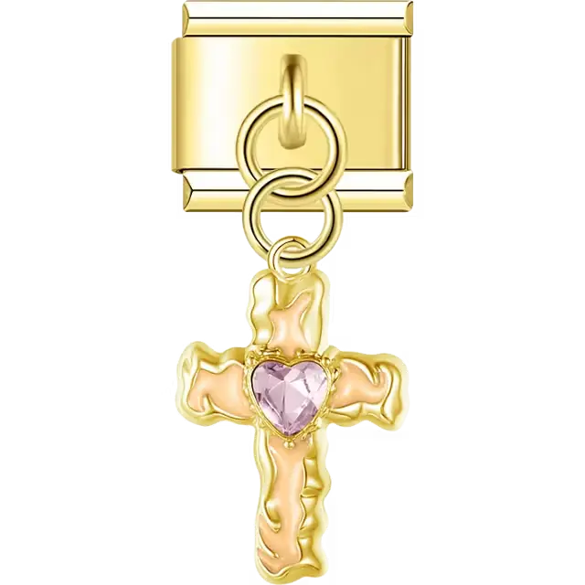 Cross with soft pink detailing and a pink heart-shaped crystal at the center in a dangle design Italian charm bracelet link