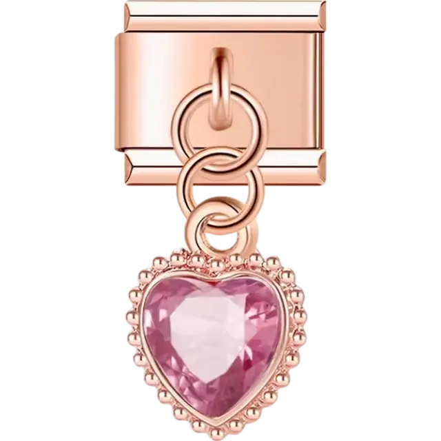 Heart-shaped pink crystal with a beaded edge suspended on a dangle Italian charm bracelet link