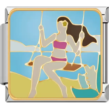 Woman sitting on a swing wearing a pink outfit with a blue sky and ocean background Italian charm bracelet link