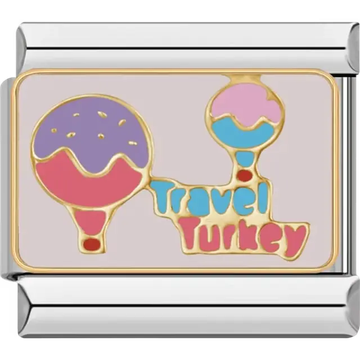 Gold hot air balloons in pink purple and blue with text reading "Travel Turkey" on a beige background Italian charm bracelet link