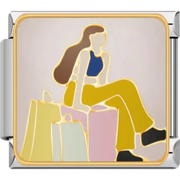 Woman sitting on pastel shopping bags wearing a blue top and yellow pants Italian charm bracelet link